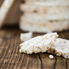 Old wooden table with Rice Cakes (detailed close-up shot)