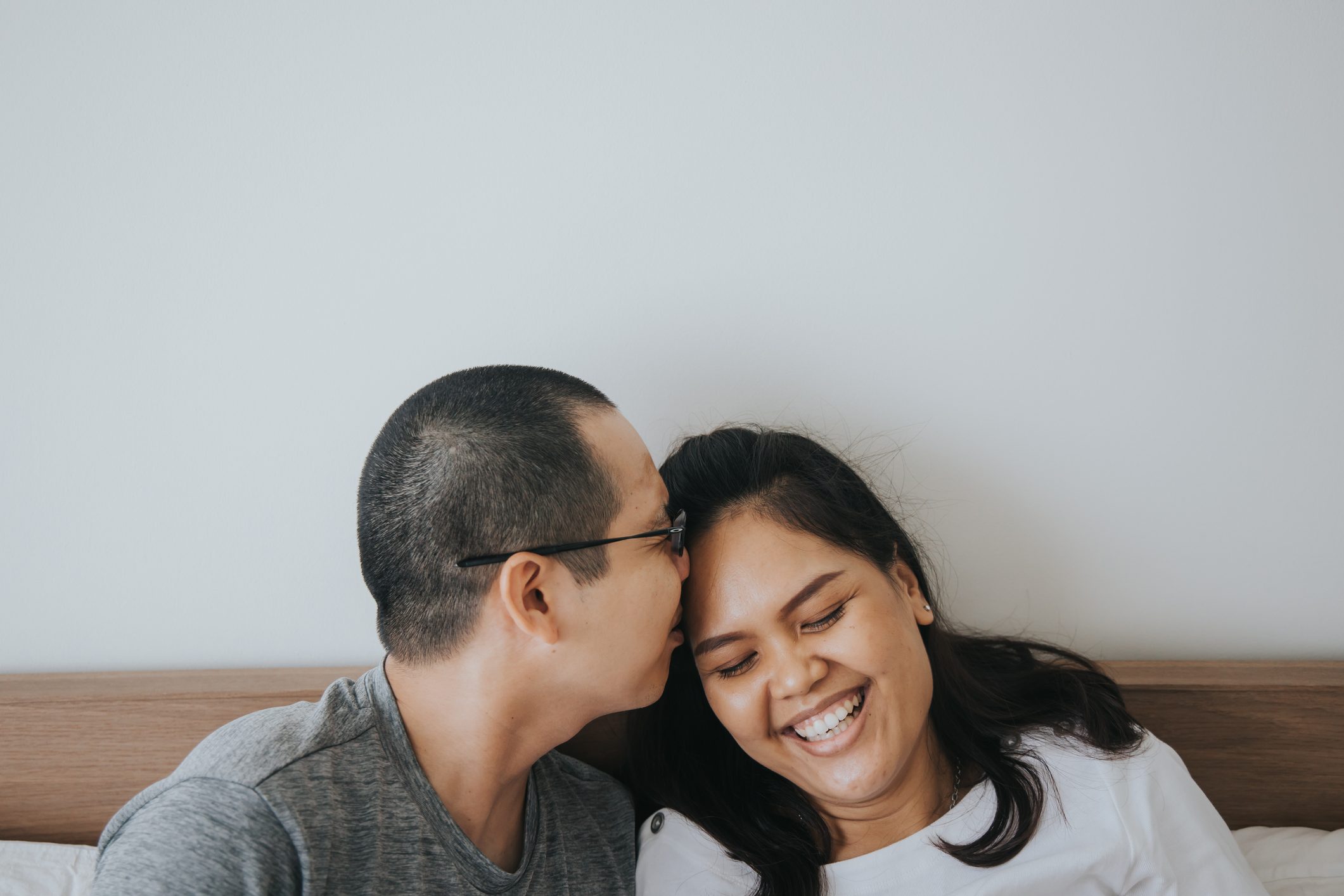 affectionate couple at home together