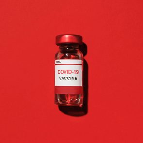 covid19 vaccine on red background