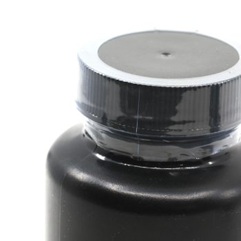 Men’s Health Pill Bottle With A Clear Safety Seal Covering The Cap